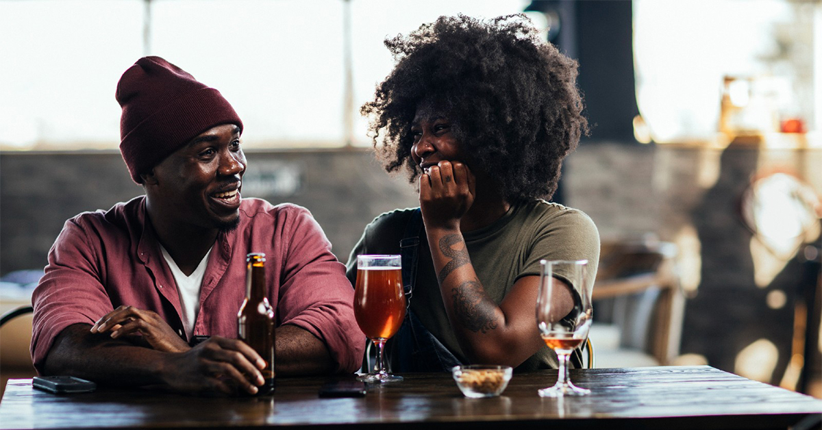 Couple enjoying drinking at a brewery in the Capital Region, NY