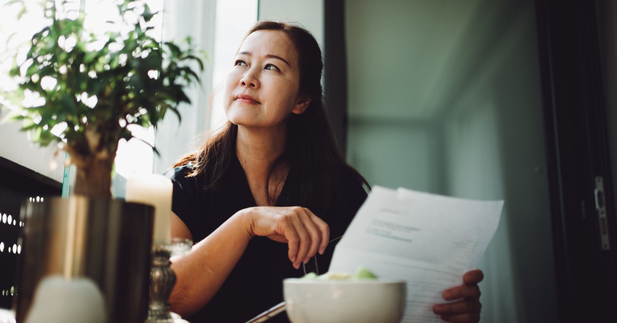 Woman reviewing life insurance policy