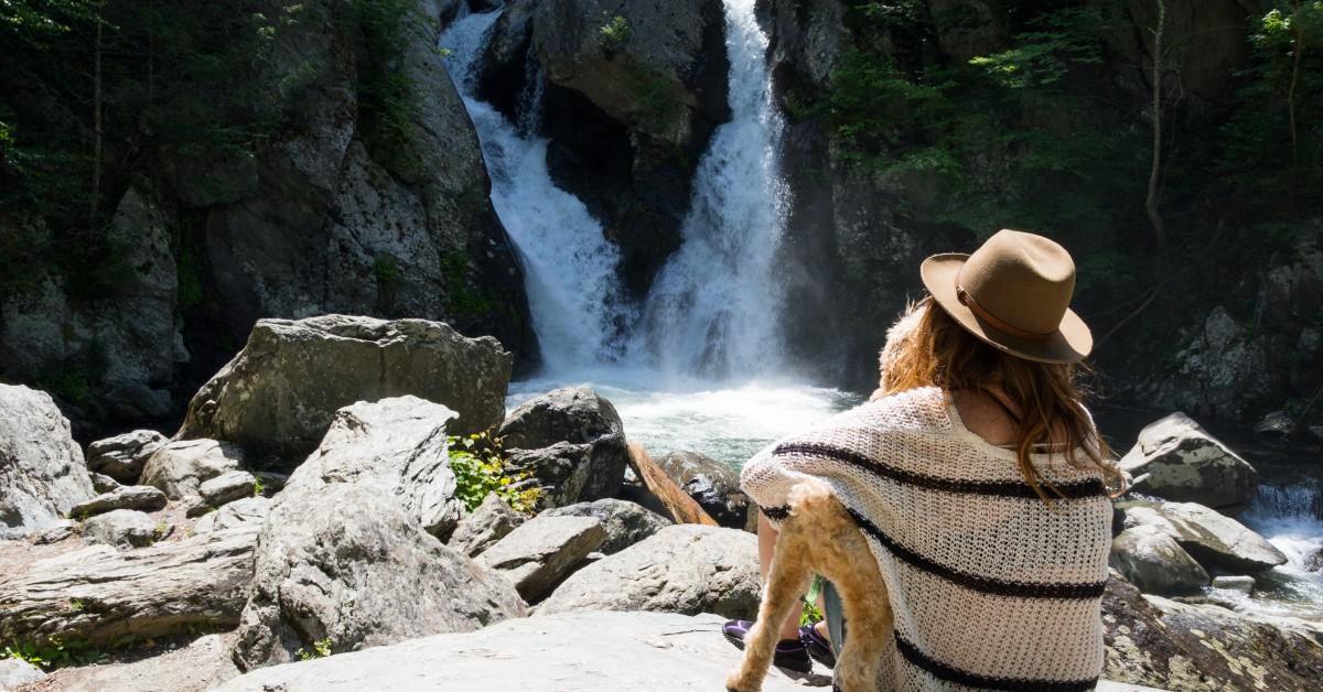 Woman and dog at Bash Bish Falls in Copake